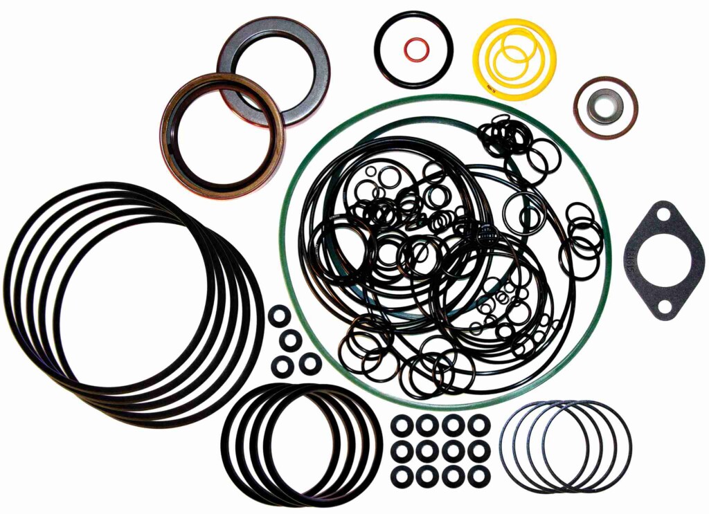 Zestaw różnych pierścieni uszczelniających i uszczelek o różnych kształtach, rozmiarach i kolorach.